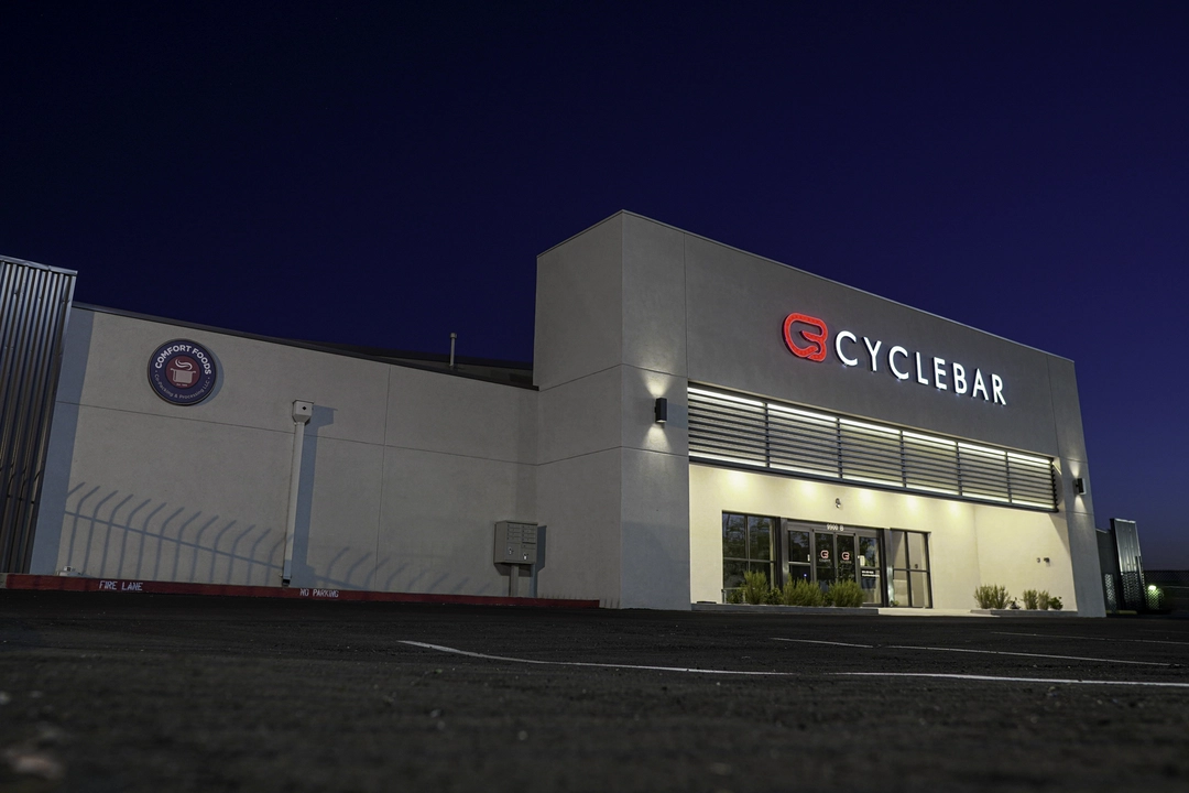 Front left view of Cyclebar exterior at night.