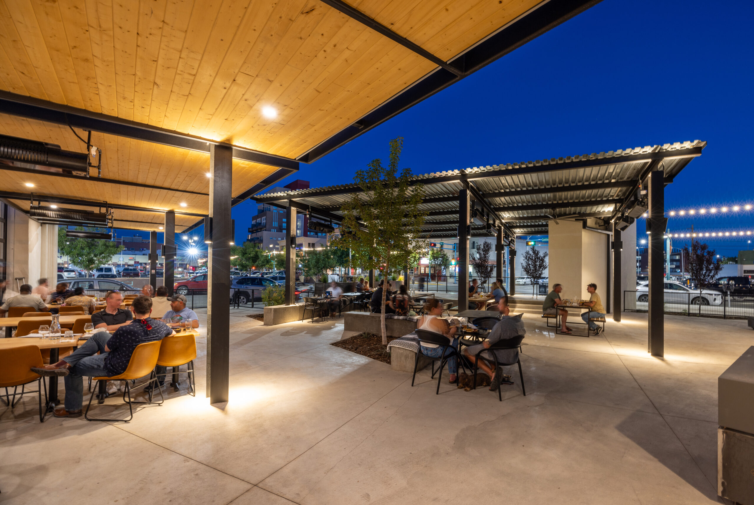 View of Ex Novo Downtown outdoor seating at night