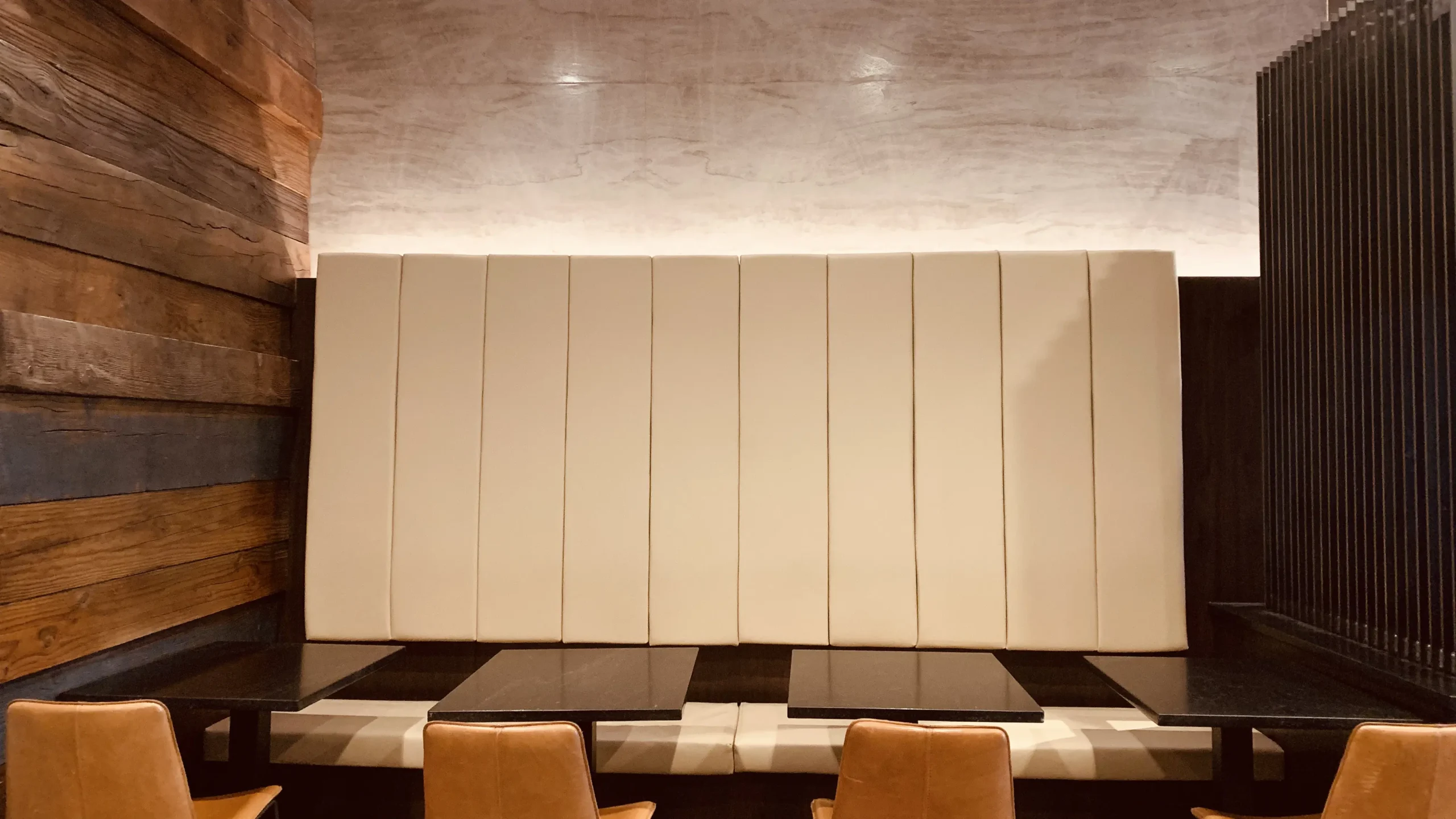 Interior of Marble Brewery with wood panel walls and steel finishes
