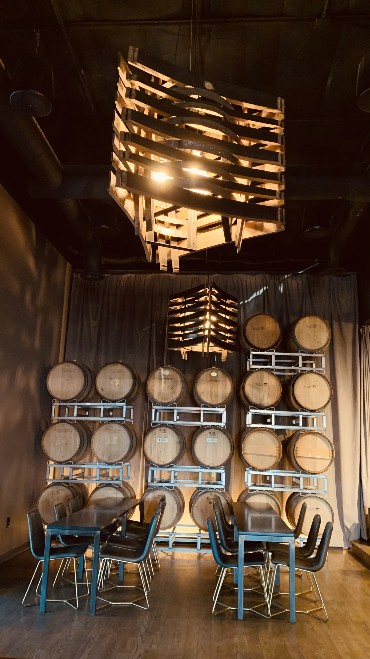 Marble Brewery interior with casks of beer on the wall