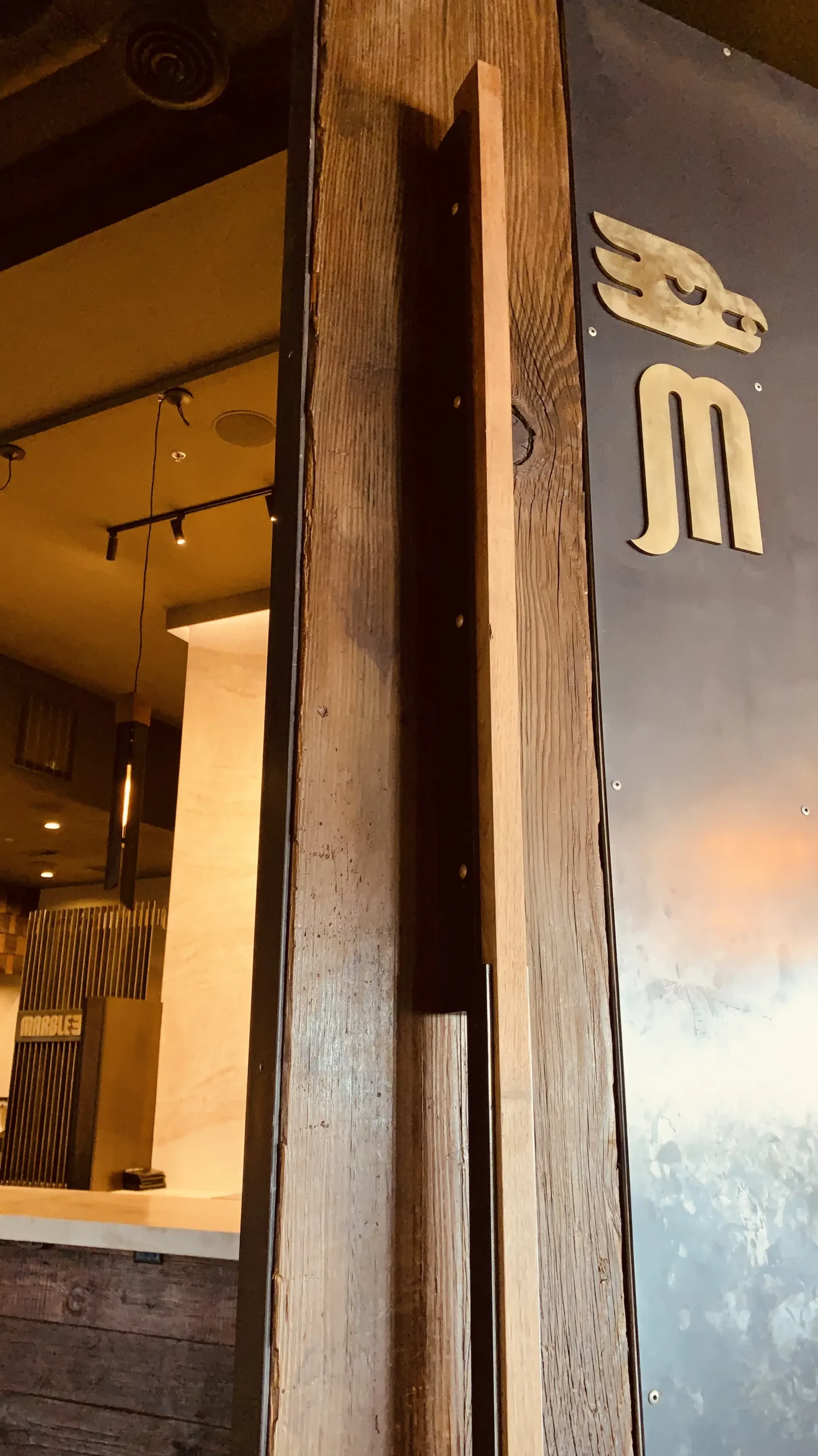 Custom doors with Marble Brewery logo